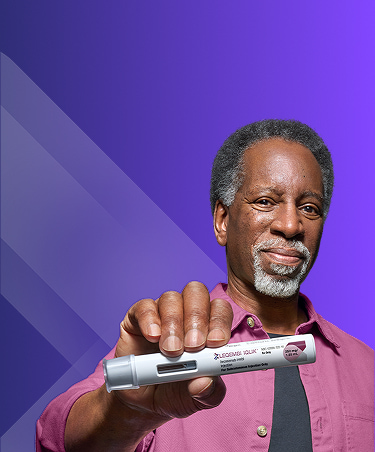 LEQEMBI® patient holding the IQLIK® autoinjector